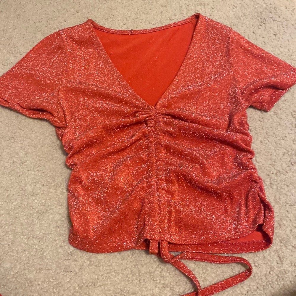 Red sparkly shirt